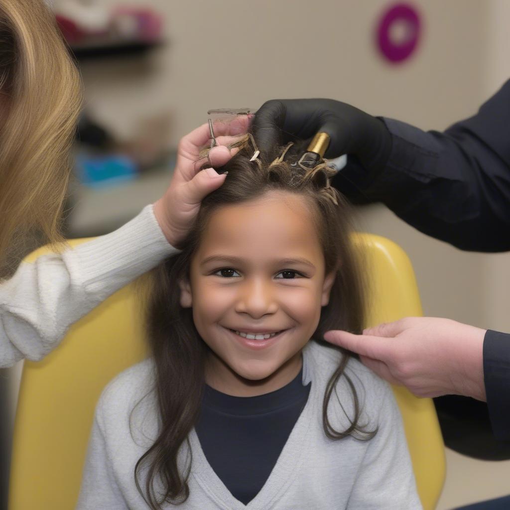 Child Receiving a Locks of Love Hairpiece