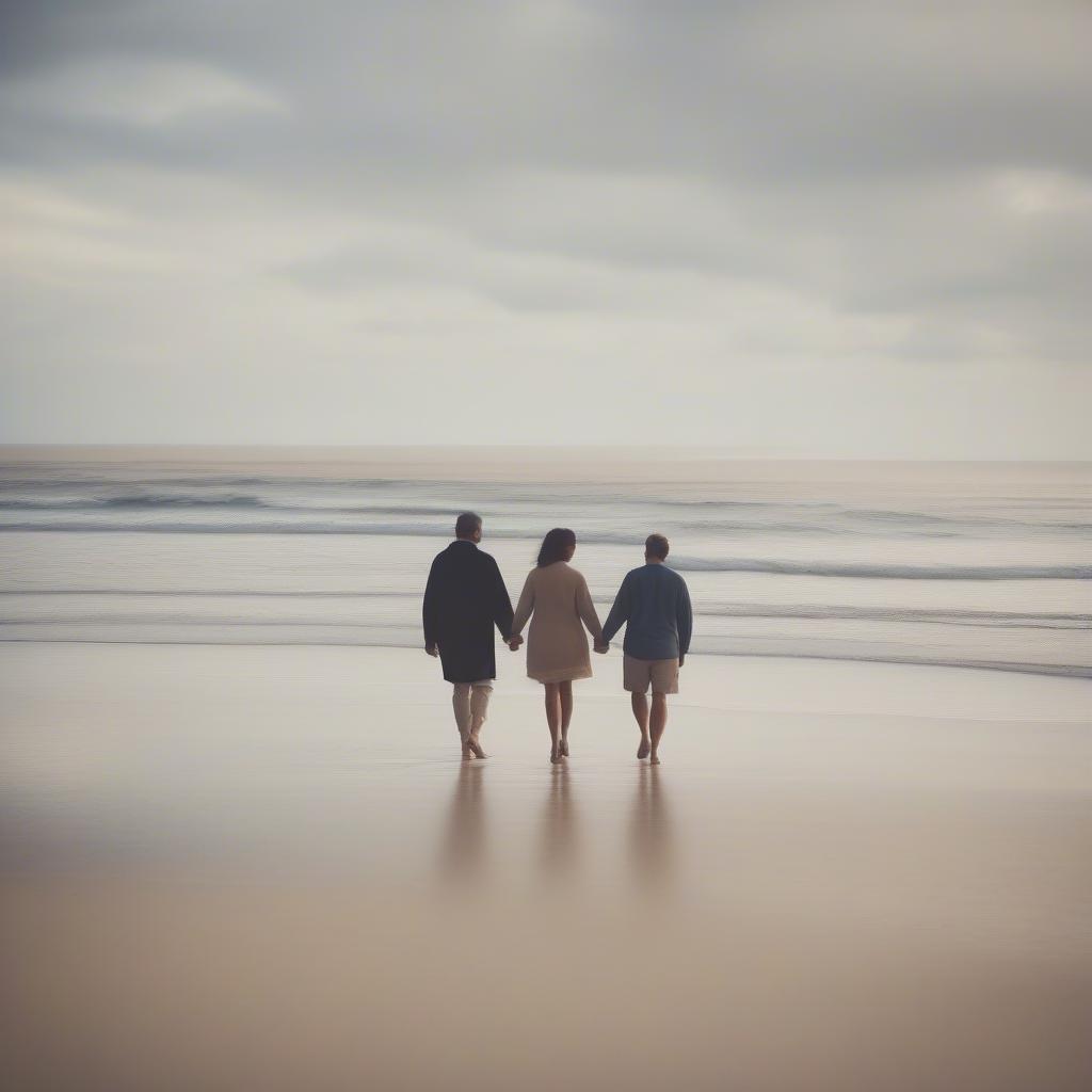 Couple Walking Hand-in-Hand on the Beach