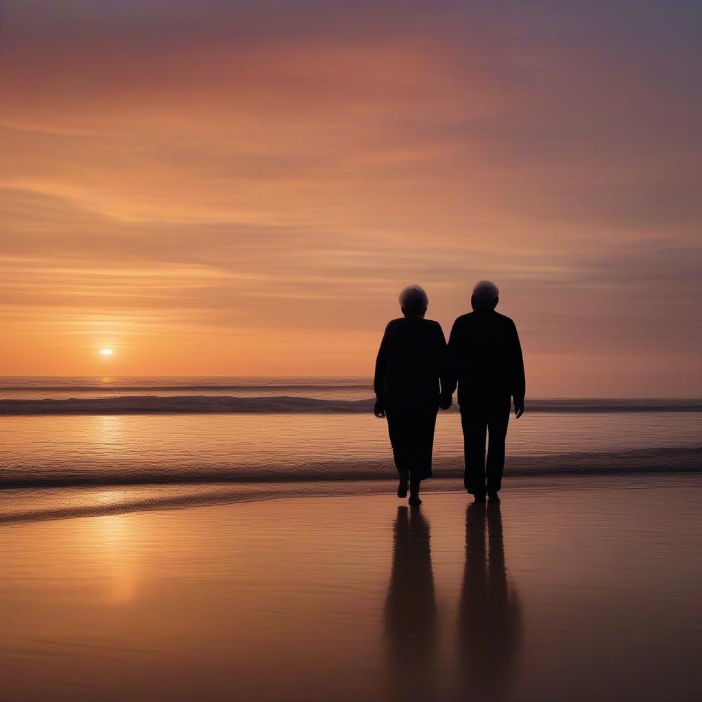 Elderly Couple Walking on Beach at Sunset