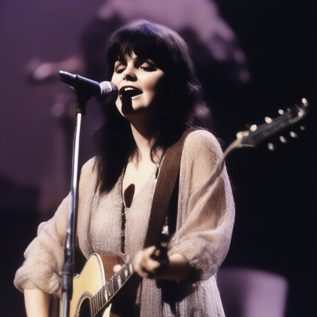 Linda Ronstadt performing on stage